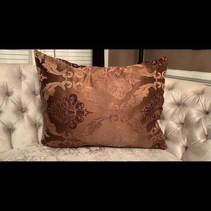 Brown oversized pillow with designs